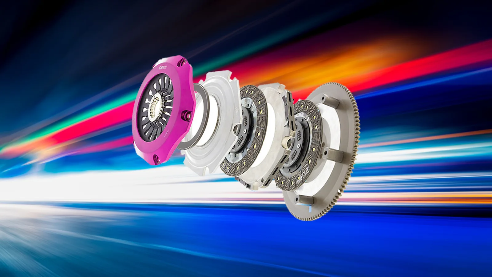 An exploded view of a clutch assembly against a colourful background